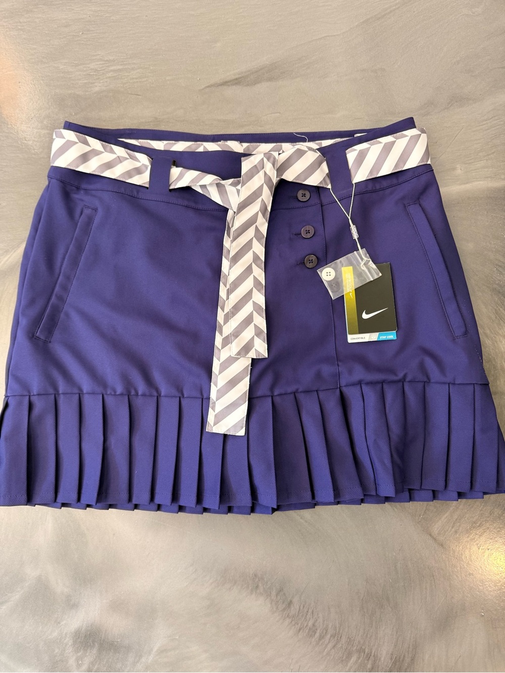 Nike Women's Purple Pleated Golf Skort with Striped Belt and removable shorts